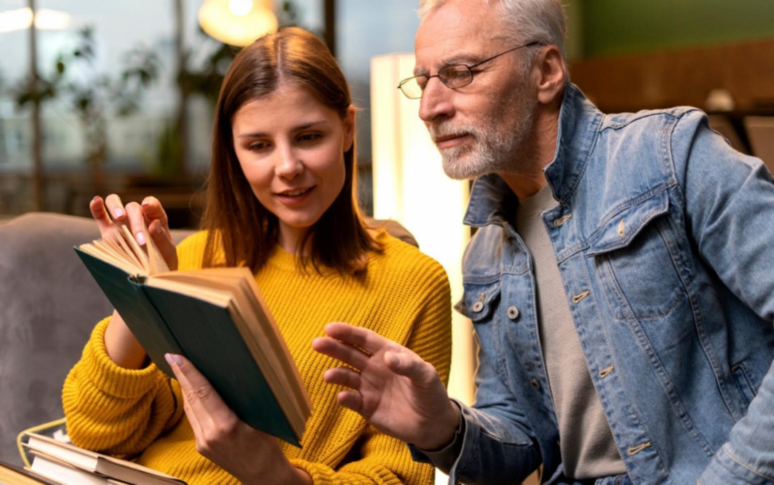 Modern office workspace with financial documents and laptop